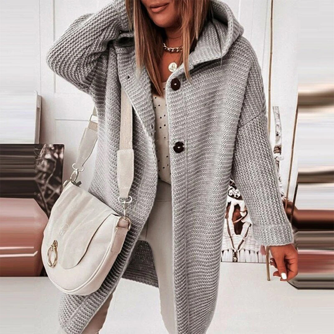 Knitted cardigan with buttons and hood