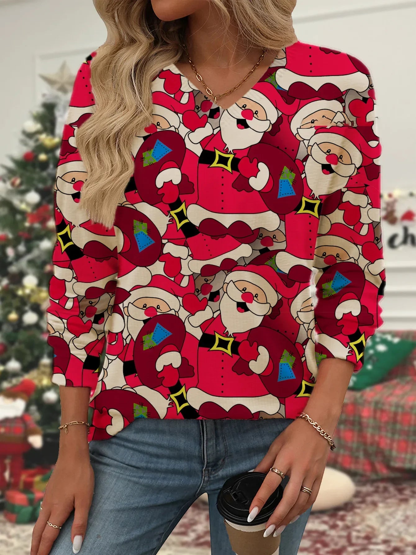 Christin - Warm knitted sweater with V-neck and Santa Claus print for women