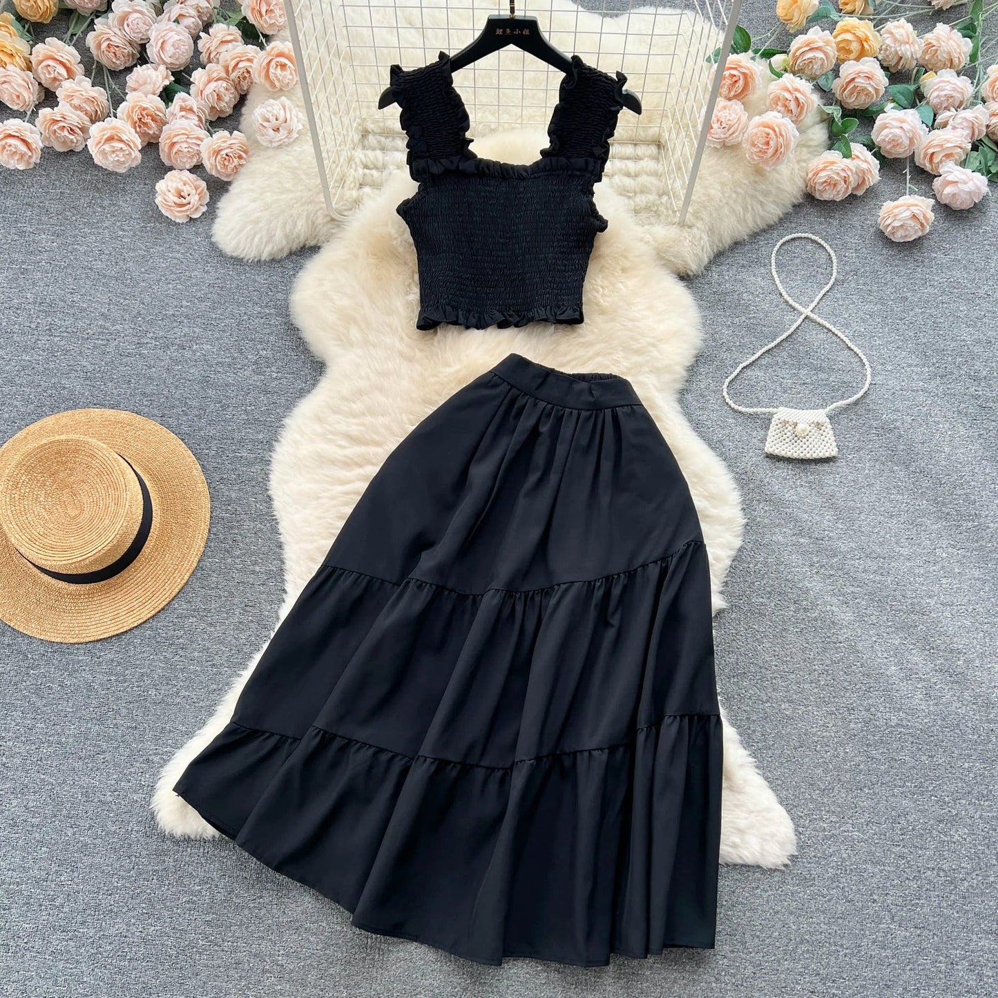 | Sleeveless pleated top and skirt set