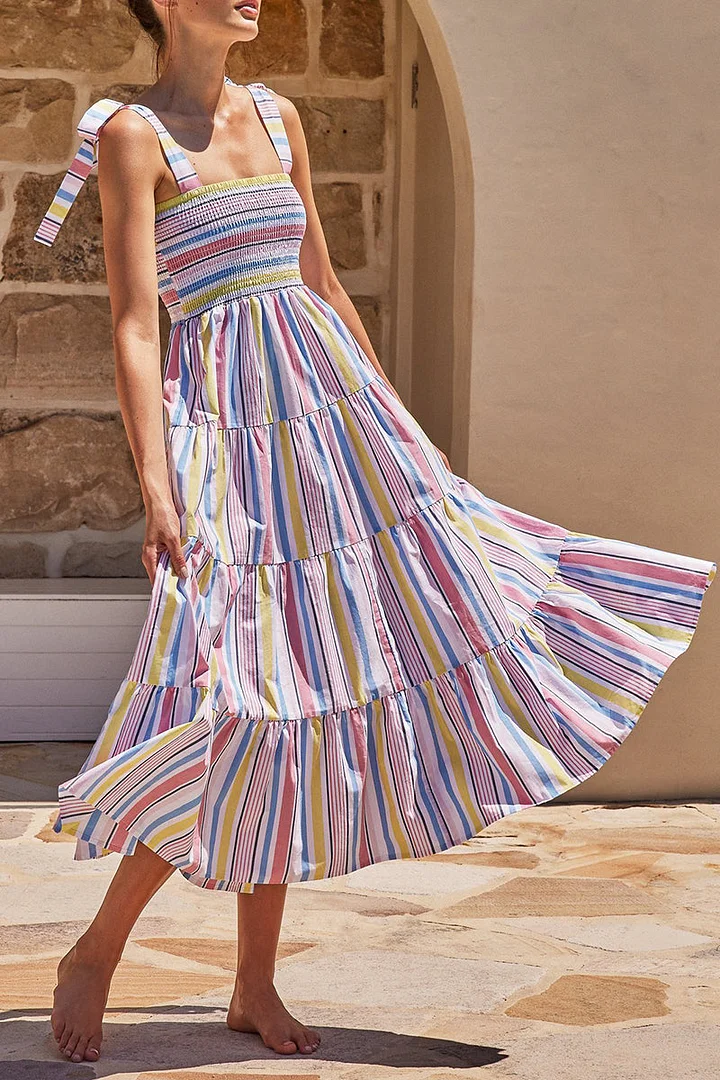 Rhea - Printed dresses with thin straps and urban fashion patches.