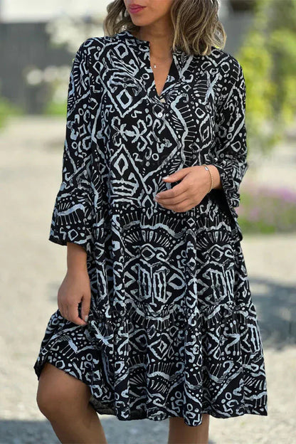 Ea | Casual dress with geometric print and buttons, V-neck, tartan skirt