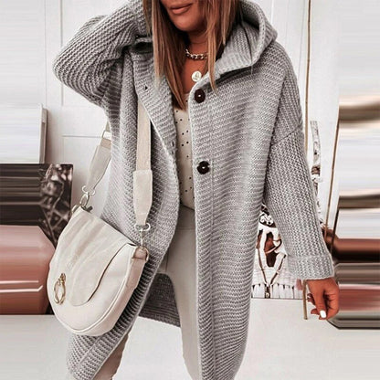 Knitted cardigan with buttons and hood
