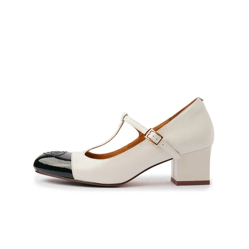 Embroidered leather pumps with high heel and T-buckle