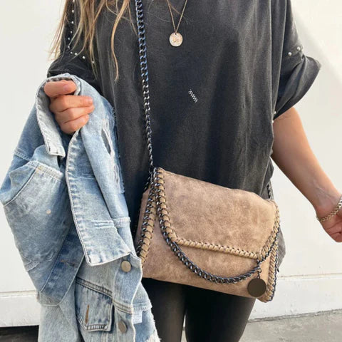 Océane - Suede clutch bag with chain embellishments