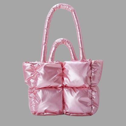 Enna - Stamp-shaped metal carrier bag with gathered design