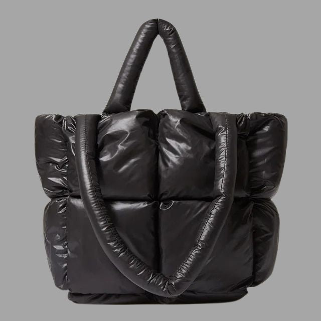 Enna - Stamp-shaped metal carrier bag with gathered design