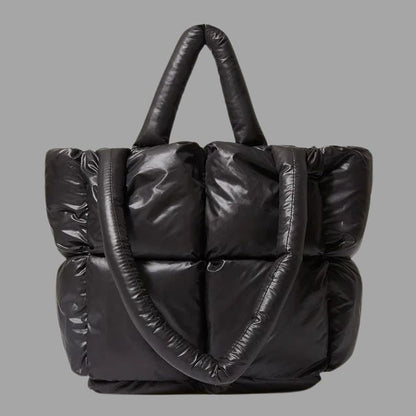 Enna - Stamp-shaped metal carrier bag with gathered design