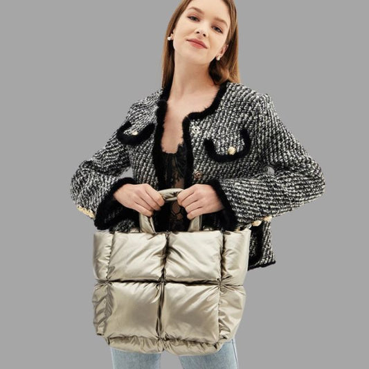 Enna - Stamp-shaped metal carrier bag with gathered design