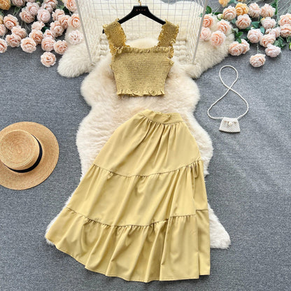 | Sleeveless pleated top and skirt set