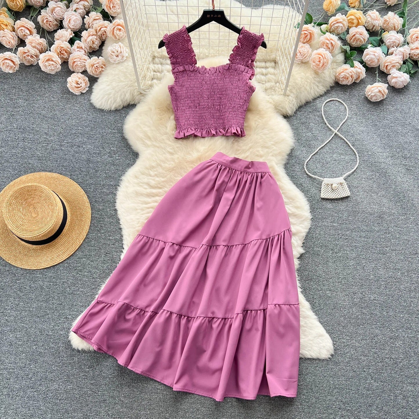 | Sleeveless pleated top and skirt set