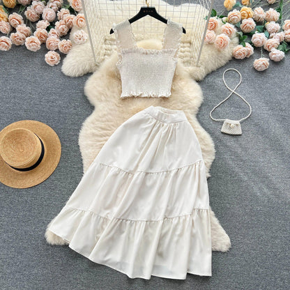 | Sleeveless pleated top and skirt set