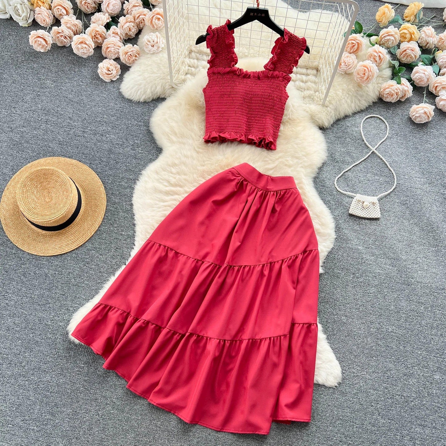 | Sleeveless pleated top and skirt set